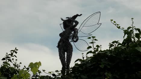 Wire-Fairy-Posing-On-The-Fence-In-Trentham-Estate-Gardens