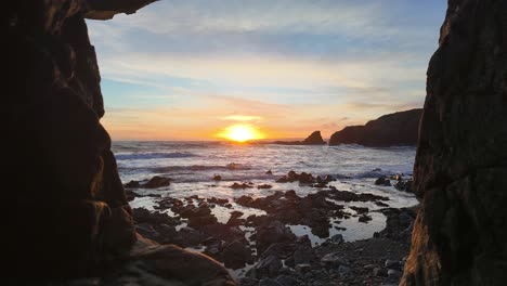 Timelapse-cinematic-cave-sunset-on-The-Copper-Coast-Waterford-on-a-winter-afternoon