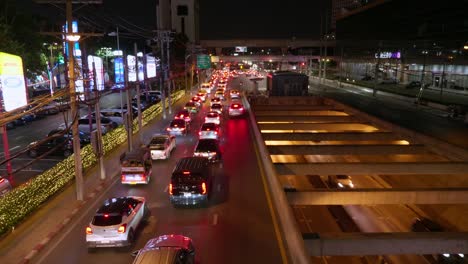 Lines-of-vehicles-stuck-in-the-traffic-on-a-nighttime-rush-hour-in-a-major-thoroughfare-in-a-busy-tourist-district-in-Southeast-Asia