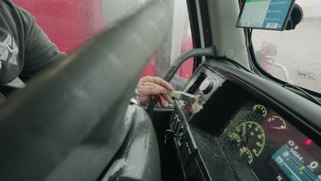 Spraying-dashboard-of-a-semi-truck