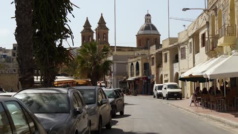 Street-View-Of-Marsaxlokk-With-The-Parish-Church-In-The-Background