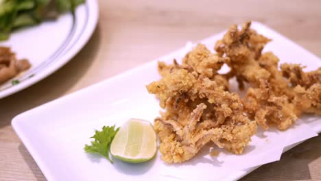 Detail-of-Fried-squid-tentacle-dish---Tempura,-in-a-restaurant