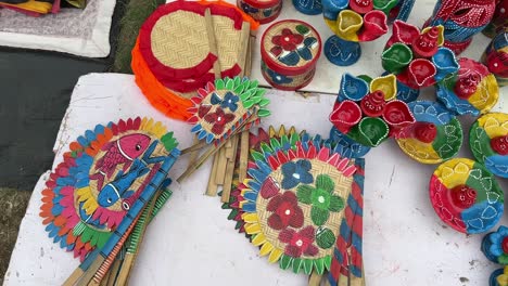 handmade-clay-diyas-and-jute-fans-displayed-at-an-exhibition-in-Purulia,-India