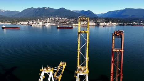 Closeup-Of-Industrial-Port-Cranes-At-Container-Terminal-On-Vancouver-Harbour-In-Canada