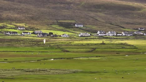 Kitesurfing-on-streams-though-lush-peatlands-of-Achill-Island,-Ireland