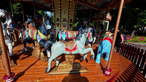 Shot-of-a-merry-go-round-carousel-slowly-moving-during-morning-time