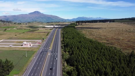La-Panamericana-sur-highway-E35-lead-to-Los-illinzas-volcanic-Andean-mountains