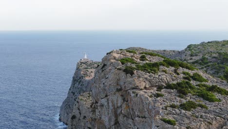 Aerial-Panorama-Of-Formentor-Lighthouse-On-Top-Of-High-Cliff,-Mallorca,-Majorca
