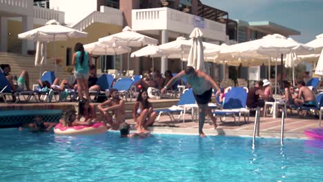 Man-Diving-in-a-Pool-During-the-Summer-Holidays,-Slow-Motion