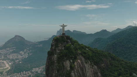 Panoramic-aerial-view-of-Christ-the-Redeemer-with-Tijuca-Forest,-Rio-De-Janeiro,-Brazil