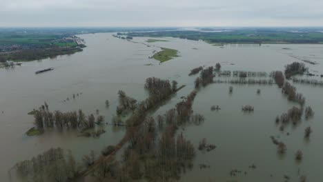 Drone-view-of-floodwaters-around-the-River-Waal-at-Gorinchem,-Netherlands