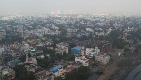 Aerial-video-of-Anna-Nagar,-Aminjikarai,-locals-of-an-Indian-neighbourhood-in-Chennai's-metropolitan-area,-one-of-the-most-important-commercials-and-slums