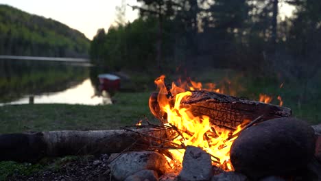 Slow-motion-of-a-campfire-by-the-lake
