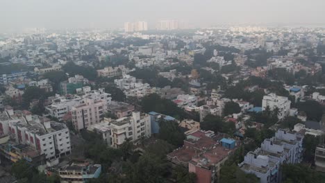 Aerial-video-of-Anna-Nagar,-Aminjikarai-locals-of-an-Indian-neighbourhood-in-Chennai's-metropolitan-area,-one-of-the-most-important-commercials,-is-available