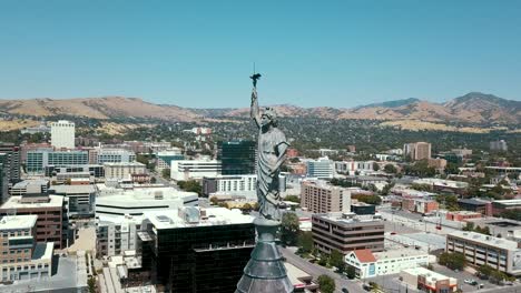 Statue-of-Miss-Columbia-in-Salt-Lake-City-with-Skyline-and-Skyscrapers
