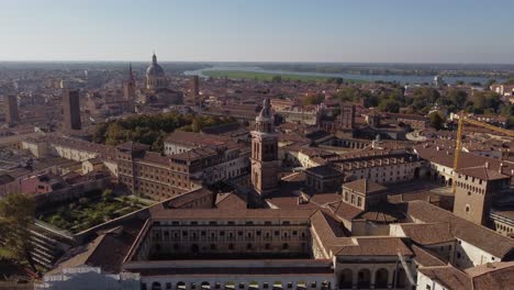 Ducale-Palace-in-Mantua,-aerial-establishing-shot,-tower-and-Sant'Andrea-dome