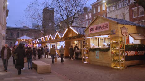 The-illuminated-Christmas-market-with-various-stalls-in-Manchester-city
