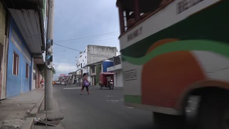 Local-Bus-Dropping-Off-And-Picking-Up-Passengers-On-Road-In-Iquitos,-Peru