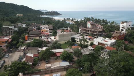 Aerial-Drone-Fly-Above-Beach-Town-of-San-Pancho-Nayarit-Mexico-Coastline-Houses