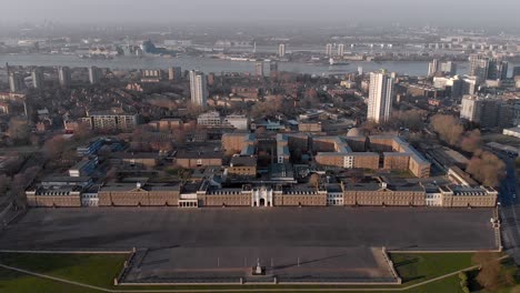 Overhead-Aerial-of-Royal-Artillery-Barracks,-River-Thames-and-London-Skyline