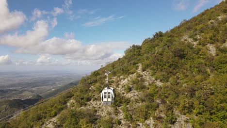 Dajti-Mountain-cable-car-filmed-by-drone,-Albania,-Europe