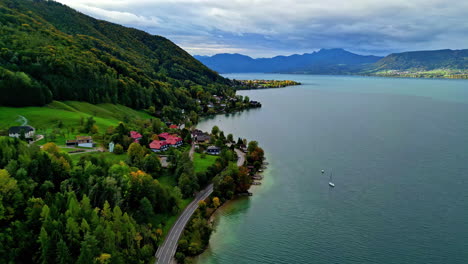 Lakeside-houses-near-lake-wonderful-peaceful-nature-picturesque-landscape,-aerial