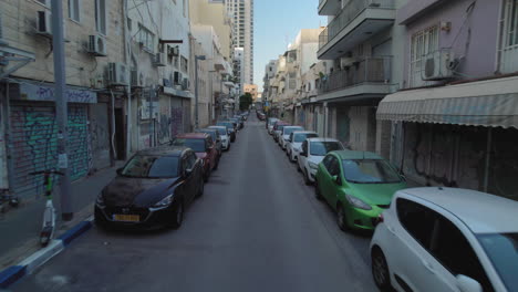 Streets-of-Florentin-neighborhood-in-the-southern-of-Tel-Aviv-,-it's-still-an-industrial-zone-with-artisans,-market,-tiny-stores---Florentin-comes-to-life-at-night-with-Tiny-bars-and-restaurants