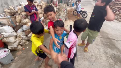 Little-kids-in-the-Cambodian-city-amid-the-internal-geopolitical-disturbance-greets-the-foreigner