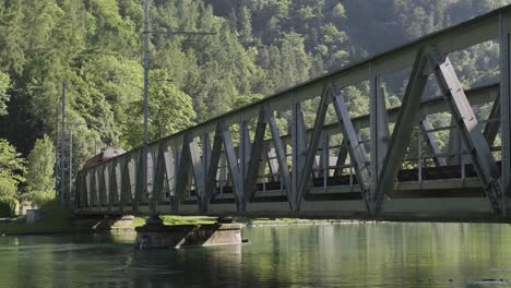 Train-passing-bridge-over-river-Aare