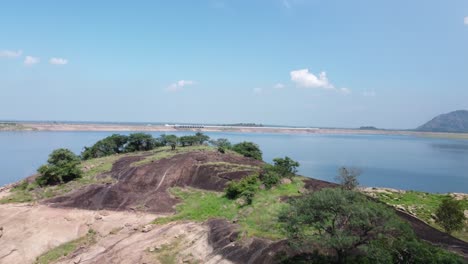 Establishing-drone-shot-of-Aliyar-Reservoir-and-Dam,-Coimbatore,-Tamil-Nadu,-South-India
