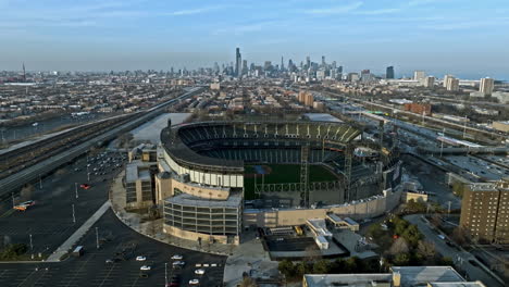 Aerial-view-rising-in-front-of-the-Guaranteed-Rate-Field,-golden-hour-in-Chicago