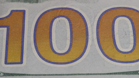 100-Zahlen-Makro-Nahaufnahme-Von-100-USD-Banknote