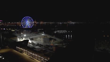 seattle-great-wheel-and-boat-in-puget-sound