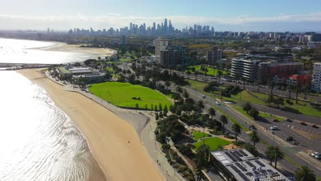 Panning-aerial-footage-of-St-Kilda-Beach,-South-of-Melbourne's-Central-Business-District