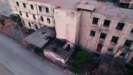 Tilt-up-of-the-abandoned-and-burned-former-maternity-of-Barros-Luco-Hospital---Santiago-Chile
