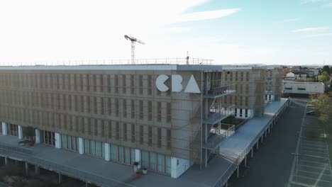 Aerial-establishing-shot-of-the-CBA-Computer-Liberal-headquarters-in-Avignon