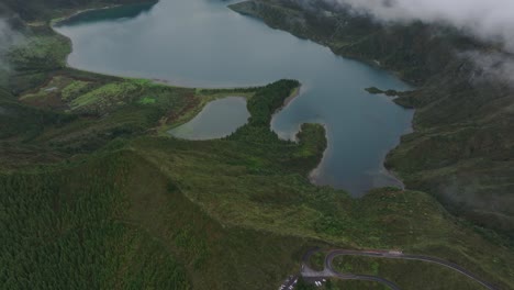 Panoramic-shot-of-Lagoa-do-Fogo-with-low-clouds-at-Sao-Miguel-island,-Azores