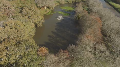 An-aerial,-top-down-view-of-Potter-Pond,-part-of-the-UHCL-wetlands-in-Clear-Lake,-Houston,-Texas