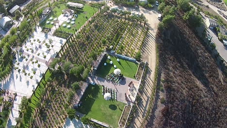 Aerial-drone-overhead-flyover-of-winery-during-wedding