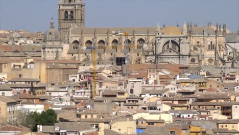 Zoomed-view-of-Santa-Maria-Cathedra-in-Toledo,-Spain,-shot-from-the-mirador-del-valle