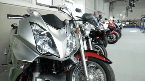 Row-Of-Motorbikes-Inside-Large-Garage