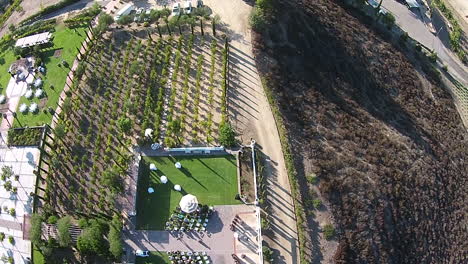 Aerial-drone-overhead-flyover-of-winery-during-wedding