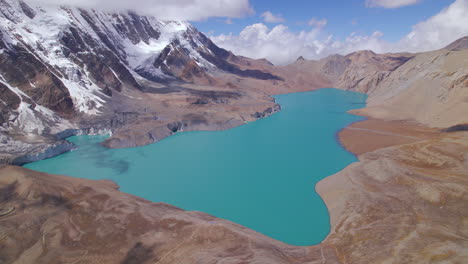 Landscape-of-World's-highest-altitude-lake-at-Nepal-Annapurna-Mountain-Circuit,-Drone-shot-reveals-beauty-of-Mountainous-region,-open-weather,-sunny,-pleasant-vacation-4K