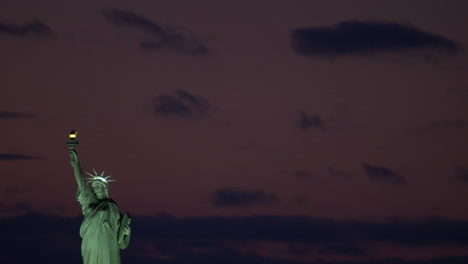 Statue-of-Liberty-Framed-Far-Left-with-Sky-Nearly-Dark