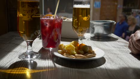 Table-bar-with-two-beers-and-a-sweet-red-wine,-tinto-de-Verano