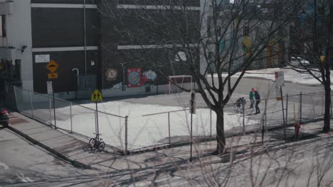 Family-Playing-Ball-Games-In-Empty-Playground-During-Quarantine-Lockdown-In-Montreal