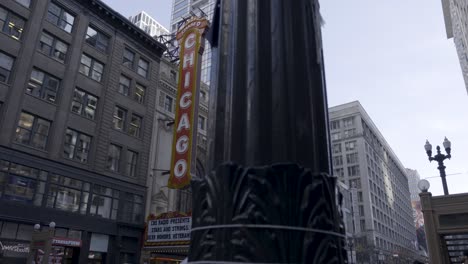 Panning-shot-of-the-iconic-Chicago-Theatre-sign-with-surrounding-architecture