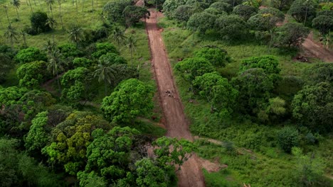 Panoramic-aerial-view-of-the-connecting-dirt-roads-in-a-typical-Kenyan-landscape