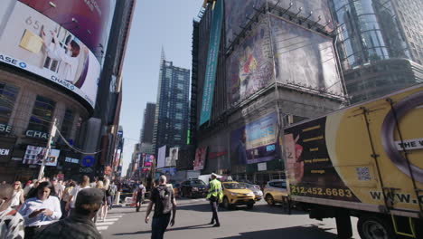 Wide-Slow-Pan-right-of-busy-intersection-in-slow-motion-midtown-Manhattan