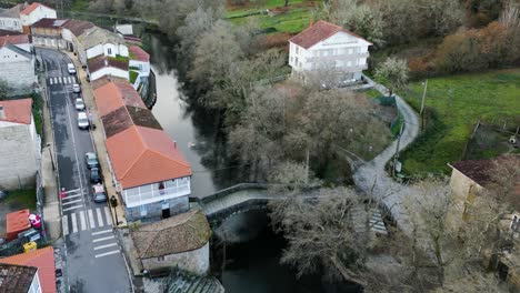 Panoramic-aerial-overview-of-historical-roman-bridge-crossing-river-molgas